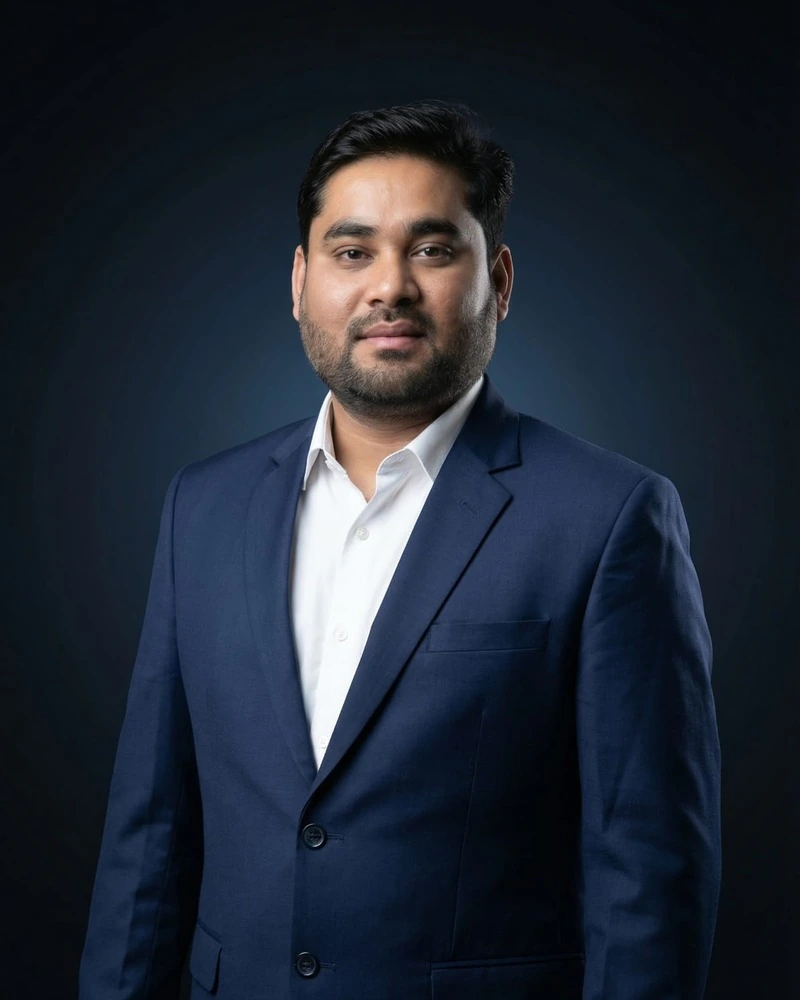 Vimal Soni, owner of Shivshakti Jewellers, in a navy suit